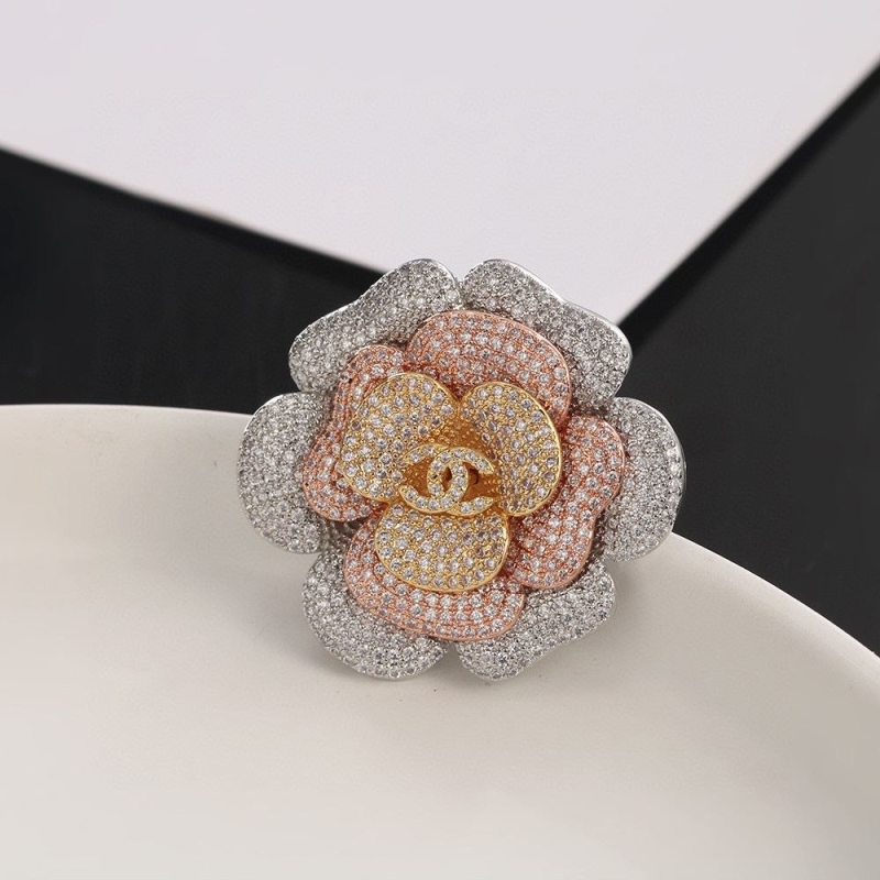 Ch**el brooches